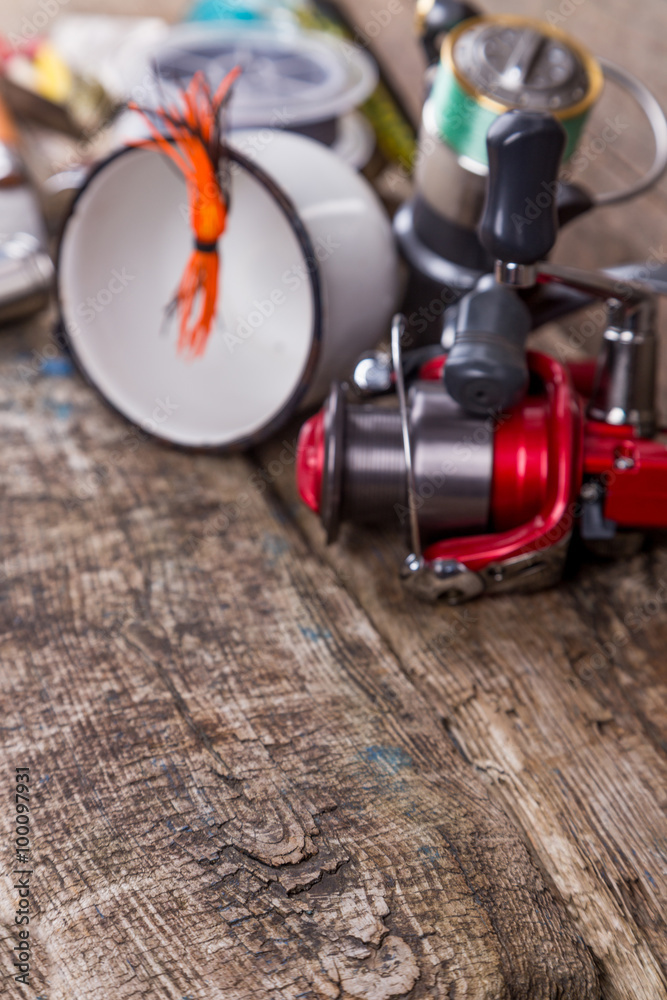 fishing tackles, baits, line with flask, knife and metal cup fishing tackles, baits, line with flask, knife and metal cup