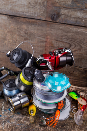 sport fishing tackles, baits, reels, spool with line