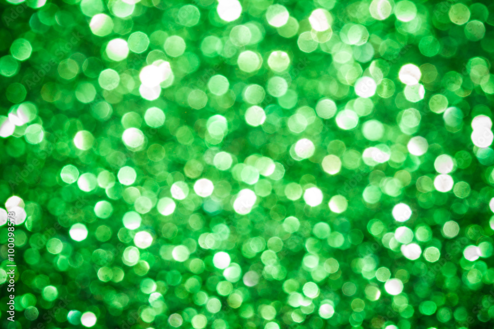 Fototapeta premium Green abstract glitter shiny background.