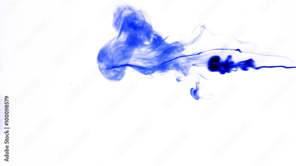 Blue ink reacting in water.Creative slow motion. On a white background. Blue ink reacting in water.Creative slow motion. On a white background.