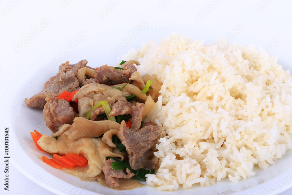 Rice and Fried beef with oyster sauce on white dish, isolated Rice and Fried beef with oyster sauce on white dish, isolated