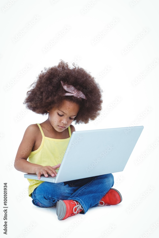 Cute girl sitting on floor using laptop Cute girl sitting on floor using laptop