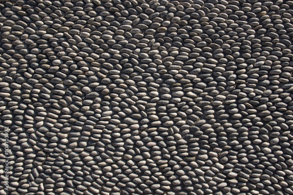 Stone pavement made of pebbles. Rhodes island, Greece. Stone pavement made of pebbles. Rhodes island, Greece.
