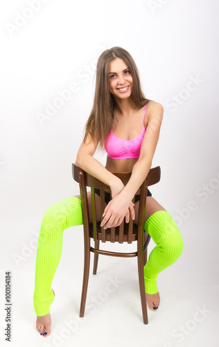 Sports slender girl is in shorts and sports socks