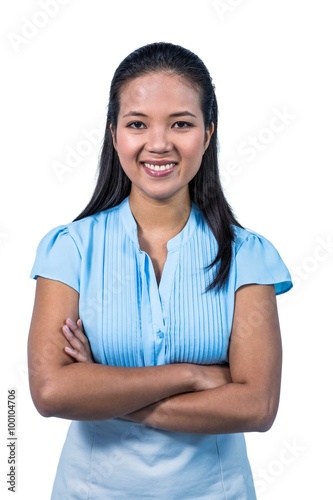 Smiling businesswoman with arms crossed © WavebreakmediaMicro