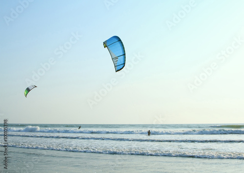Kiteboarder enjoy surfing in the ocean