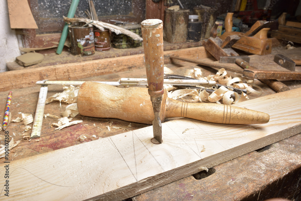 carpenter working with plane on wooden carpenter working with plane on wooden