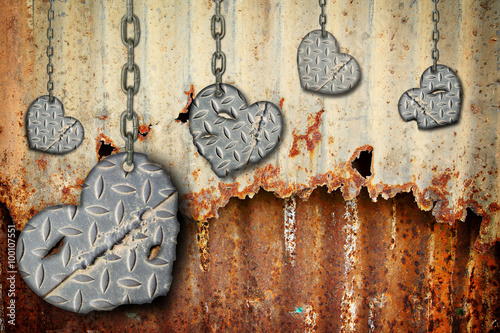 background hearts of steel with scratches hanging on chains
