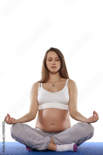 pregnant woman in lotus position