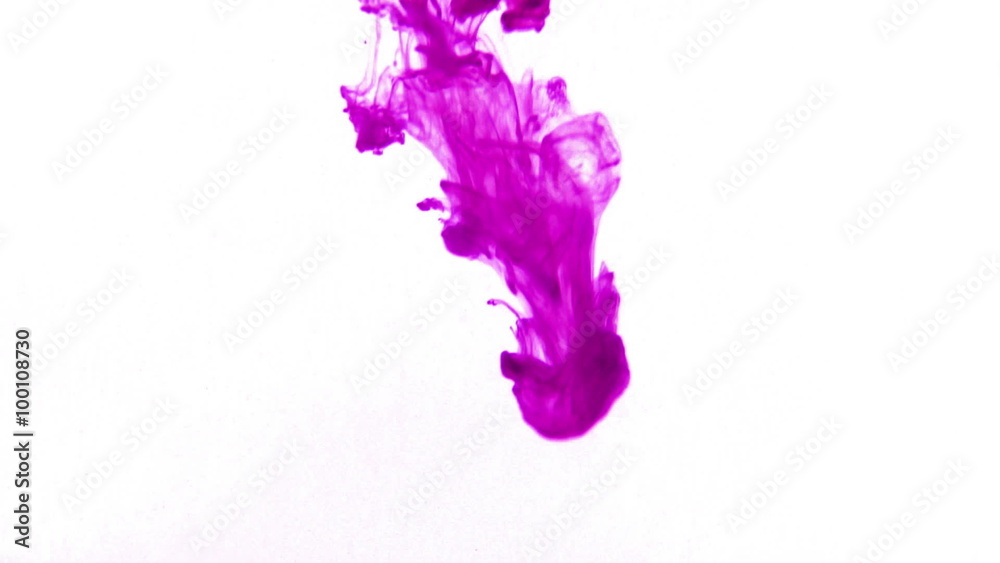 Pink ink in water.Creative slow motion. On a white background. 

