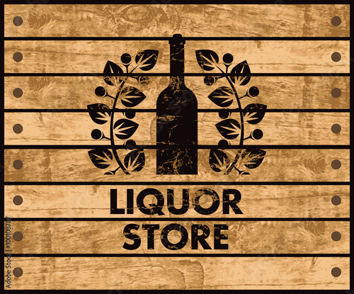 wooden box with a picture of the bottle of wine and liquor store sign