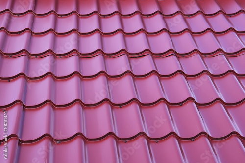 Roof with metal tile
