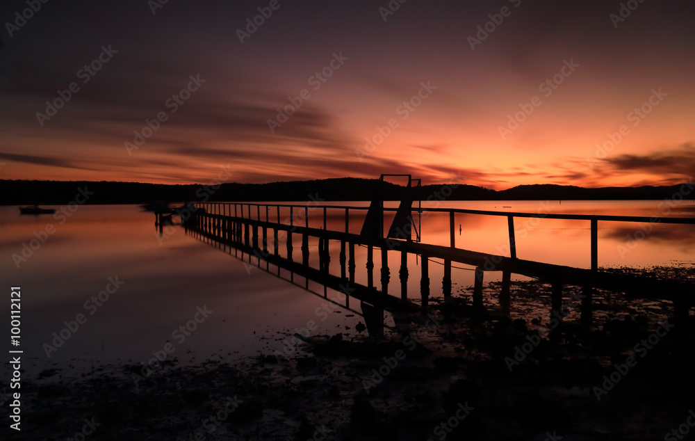 Summer sunset silhouettes at Kincumber jetty