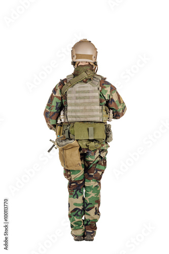 Ranger standing in woodland camouflage and modern machine gun. I
