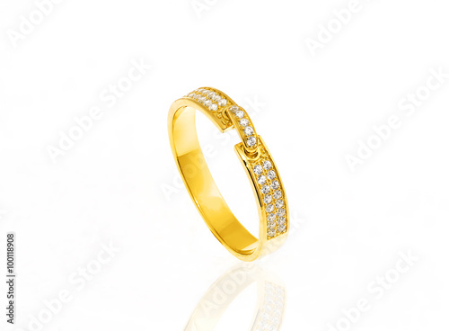 Golden ring with diamond isolated on white...