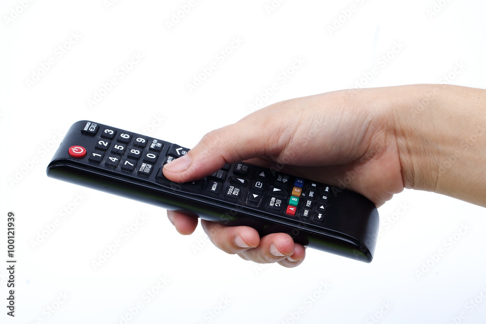 hand holding remote control isolated on white background. hand holding remote control isolated on white background.