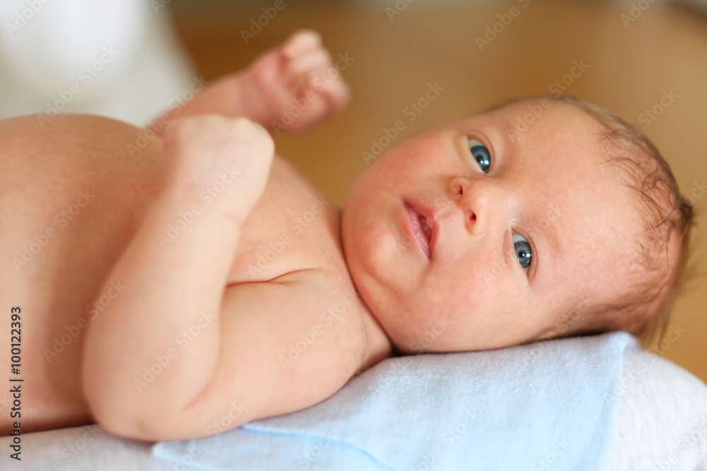 One month old newborn baby with mother One month old newborn baby with mother