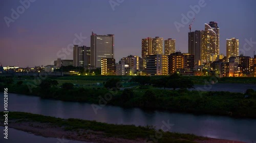 Kawasaki, Japan skyline at the Tamagawa River. photo