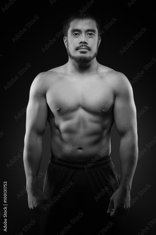 Fototapeta premium Portrait of an handsome asian athlete