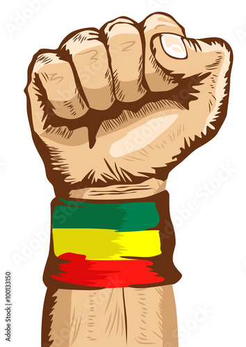 fist wearing a flag of Ethiopia wristband clenched tight