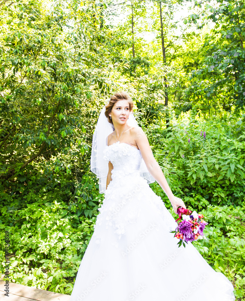 Beautiful Caucasian bride in the forest Beautiful Caucasian bride in the forest