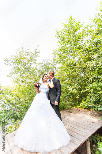 Happy bride and groom on their wedding day photo