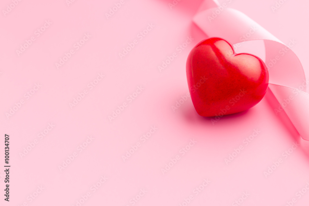 pink ribbon with red heart