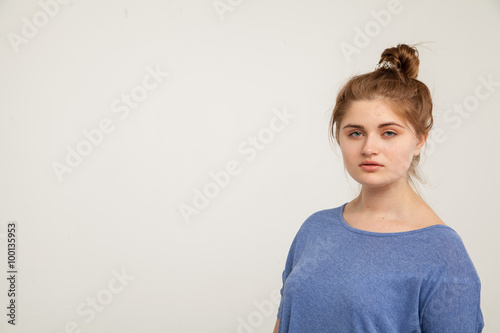 Beautiful young woman in fashion purple leather jacket . Isolated over white background