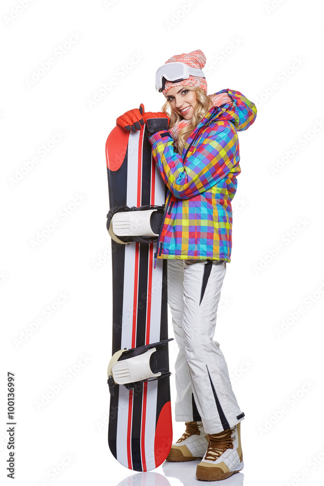 a beautiful sexy woman with a snowboard in studio