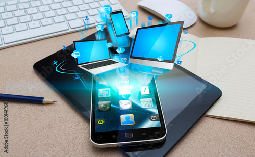 Wallpaper Mural Modern mobile phone connecting tech devices Torontodigital.ca