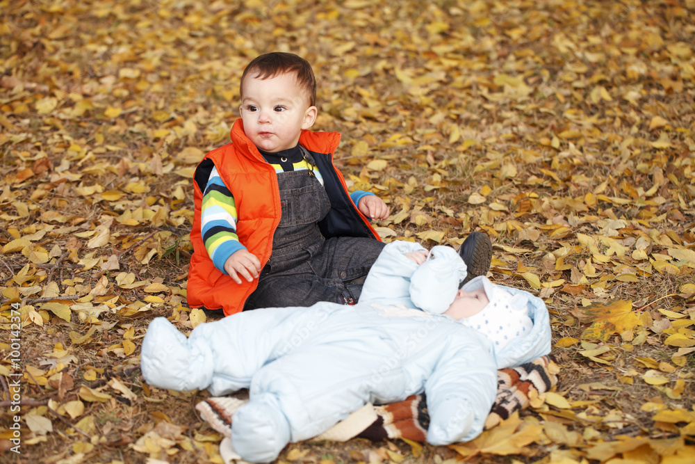 Two little boys outdoor autumn Two little boys outdoor autumn