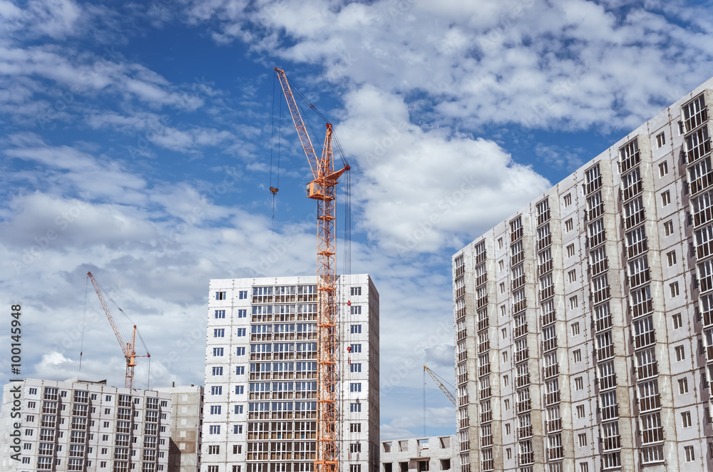 Construction cranes and new high-rise buildings Construction cranes and new high-rise buildings