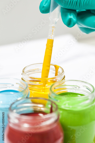 Colorful paints in jars