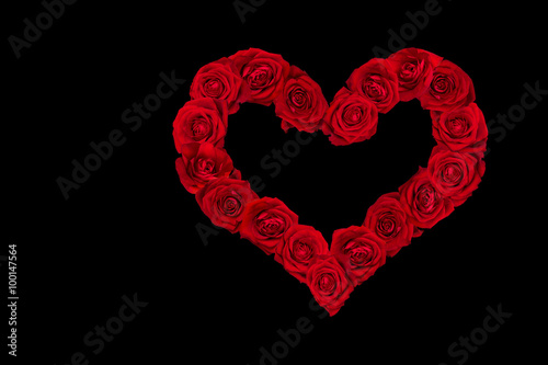 Valentines Day Heart made of Red Roses.  Black Background.