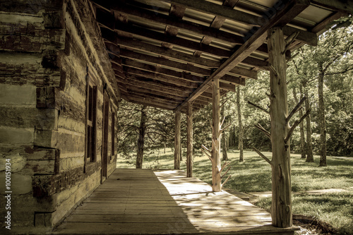 Appalachian Living. Front porch of a historic Appalachian log cabin in the mountains. This is a public building in a state park and not privately owned.