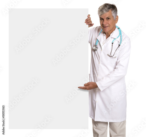 Full length portrait of medical doctor looking at blank billboar photo