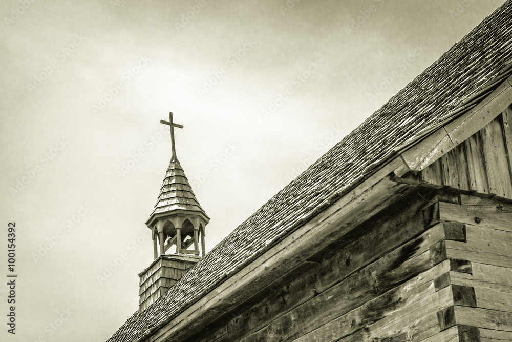 Old Wooden Church. Steeple of a historical wooden church in black and white.
