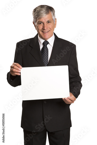 Portrait of happy smiling young business man showing blank signb photo