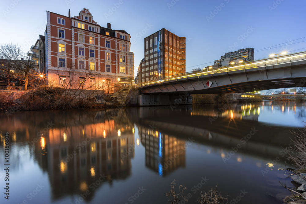 In quarter Black Bear on Ihme river in Hannover at winter evening. Lower Saxony. Germany.