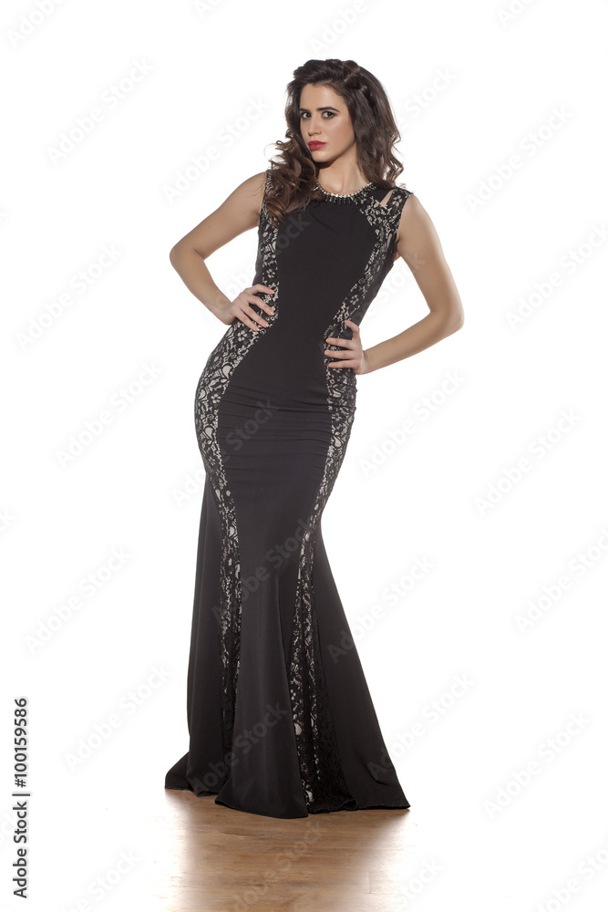 attractive brunette in an elegant evening gown attractive brunette in an elegant evening gown