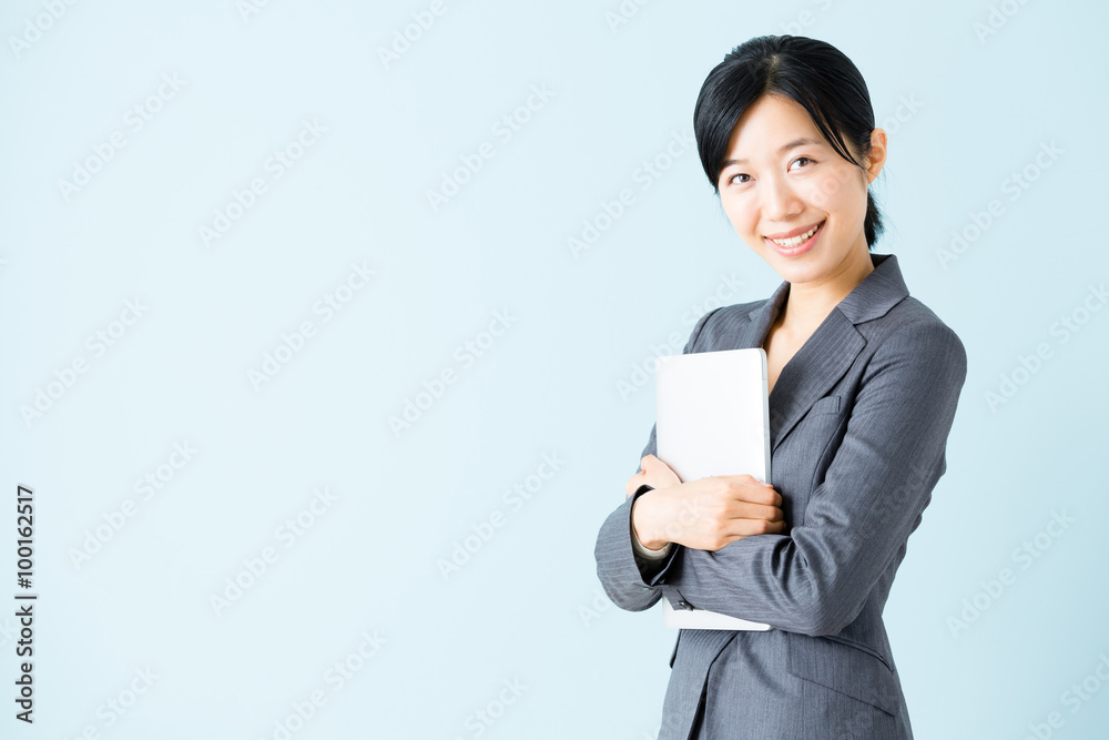 asian businesswoman isolated on blue background asian businesswoman isolated on blue background