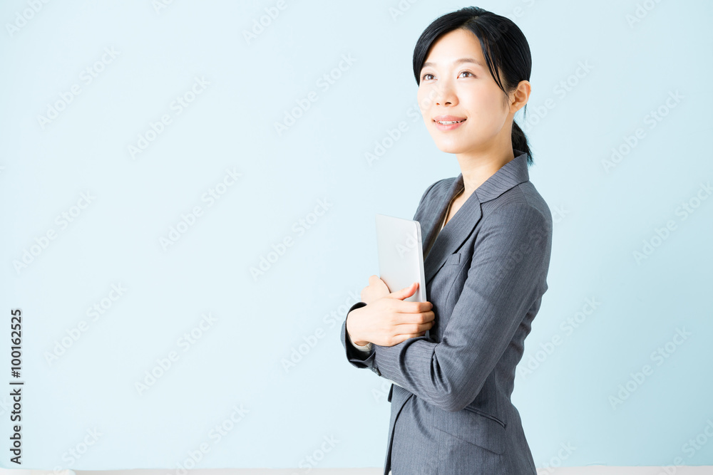 asian businesswoman isolated on blue background asian businesswoman isolated on blue background