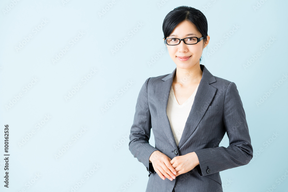 asian businesswoman isolated on blue background asian businesswoman isolated on blue background