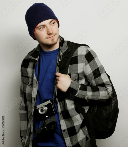 young  photographer over white background photo