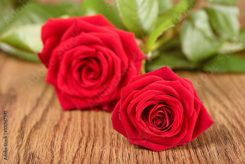 Photo of roses on wooden
