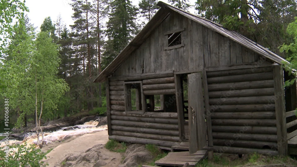 Abandoned hunting Lodge in the forest. On the banks of the river. Abandoned hunting Lodge in the forest. On the banks of the river.