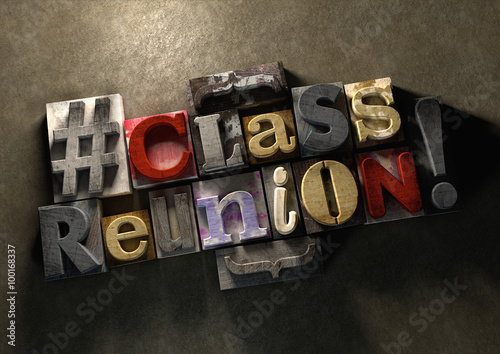 Class Reunion title on wooden ink splattered printing blocks. Grungy typography on a concrete background. Education themed title for reuniting old school friends and class mates