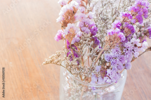 Fototapeta Naklejka Na Ścianę i Meble -  Beautiful statice flower bouquet on wooden table
