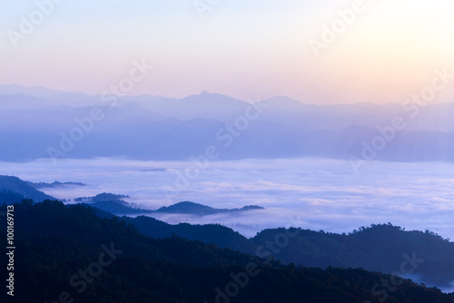 Silhouette of Sunrise and mist with mountain at Huai Nam Dang National Park in Chiang Mai and Mae Hong Son, Thailand. © Eakkaluk