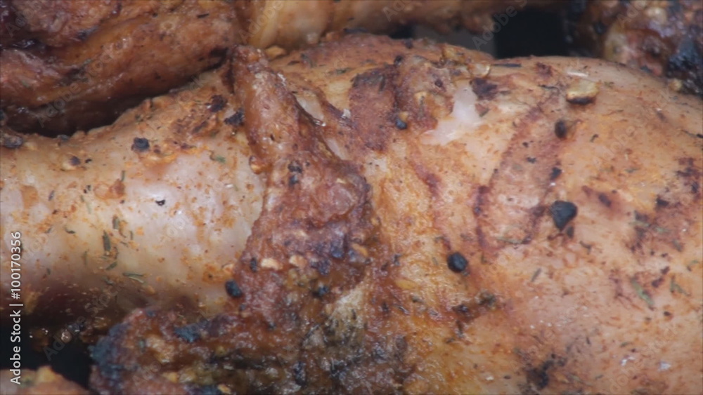 Close up of browning chicken drumstick on the grill 2 Close up of browning chicken drumstick on the grill 2